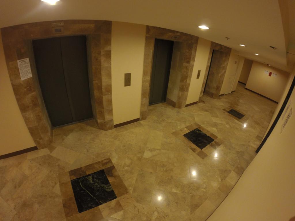 Burgundy Mckinley Place Service Apartment Manila Bagian luar foto